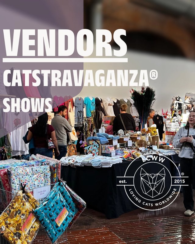 Shoppers and vendors browsing booths of colorful goods at a Catstravaganza vendor show