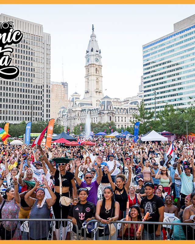 Large crowd filling LOVE Park in Philadelphia during Concilio's Hispanic Fiesta, with city hall in the background.