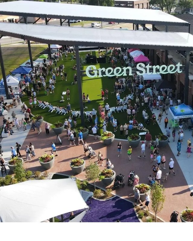 Aerial view of a crowd at tents and booths on Green Street in downtown Lee's Summit